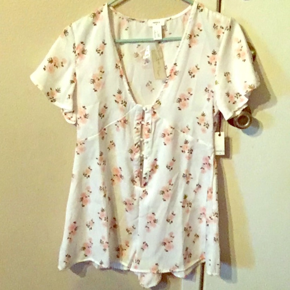 Small floral jumper hasn’t been worn